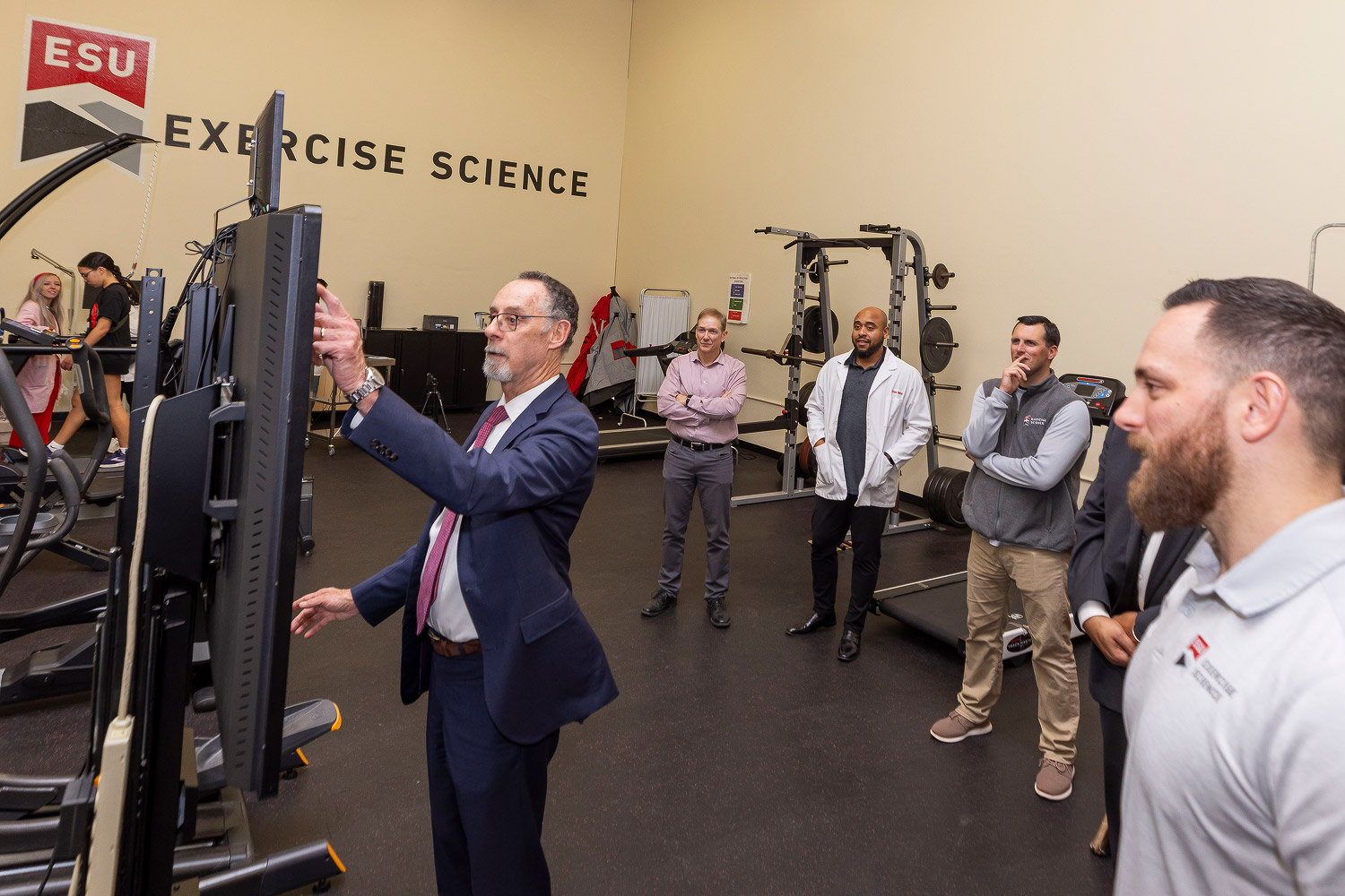 Chancellor Fiorentino gains hands-on experience with training equipment in East Stroudsburg University's Exercise Science lab.