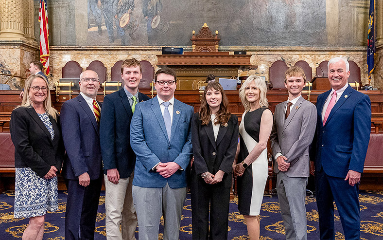 Kutztown University Student Government Association members pose in the historic House Chamber at the state Capitol.