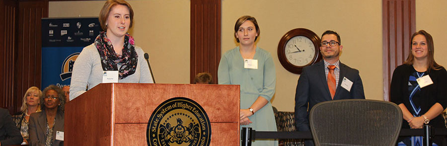 Students presenting at board meeting