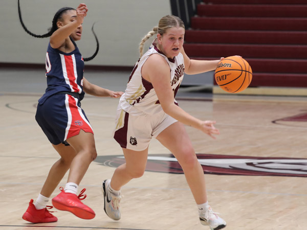 Lauren Kirsch defends the ball for Commonwealth University - Bloomsburg.