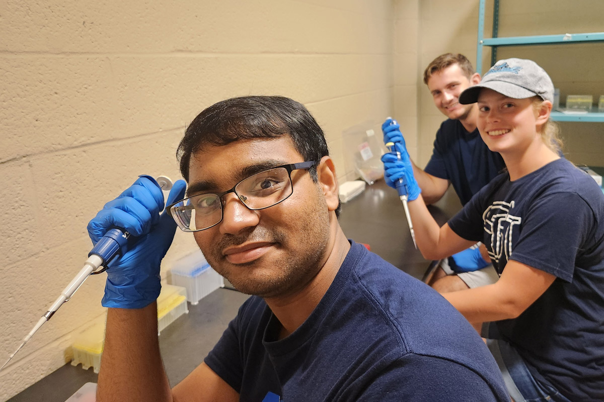 Shippensburg University biology majors, Aryan Gaonkar, Cameron Lyons and Aubrey McBride, in the lab