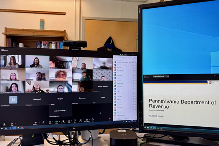 Computer screen showing online virtual meeting of studentas with the Pennsylvania Department of Revenue