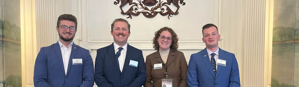 Allyson Ritchey ’24 Aidan Piper ’24 Ethan Bauman ’24 and Harun Pacavar SGA President ’24 attended the Governor’s College Day of Action